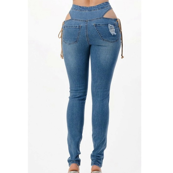 Distressed Denim jean with side tie. - Picture 3 of 3